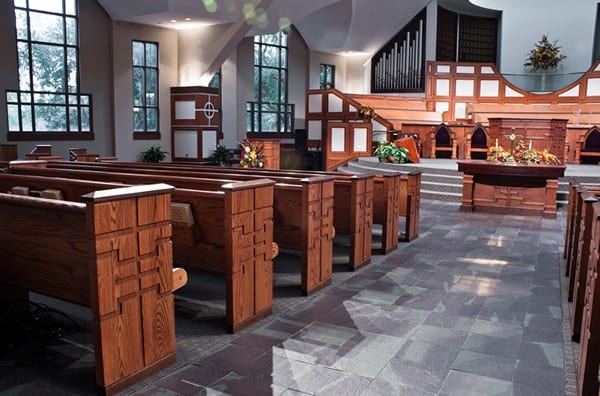 walkway showing altar table and pew ends