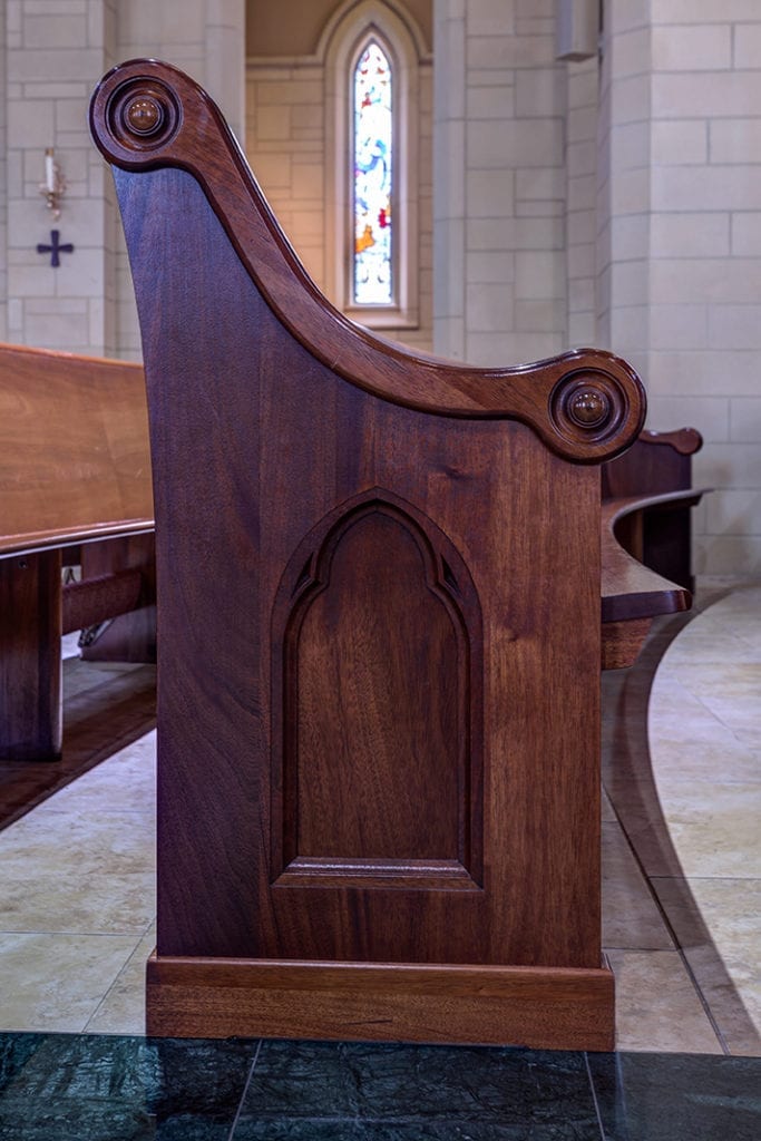 Wooden pew side view
