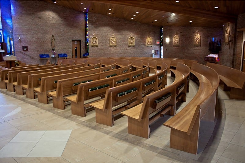 rows of pews in curch