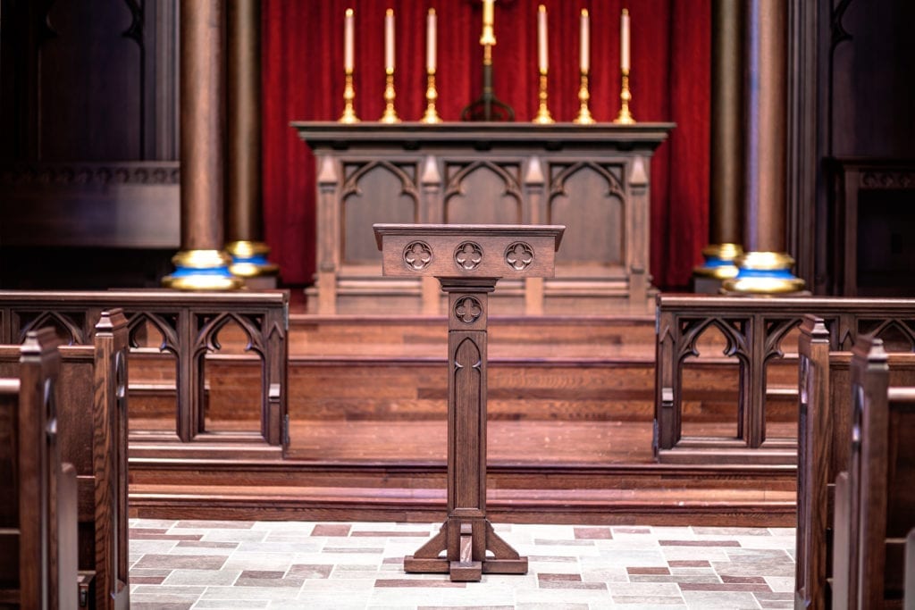Wooden podium in front of sanctuary